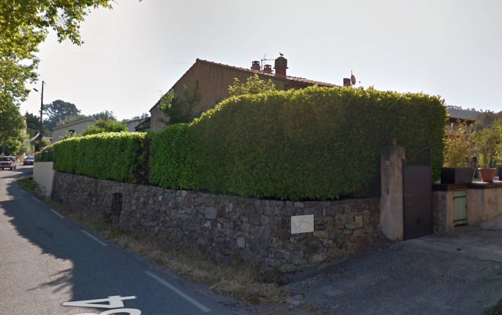 Remplacement de la haie par une palissade en bois à Bras